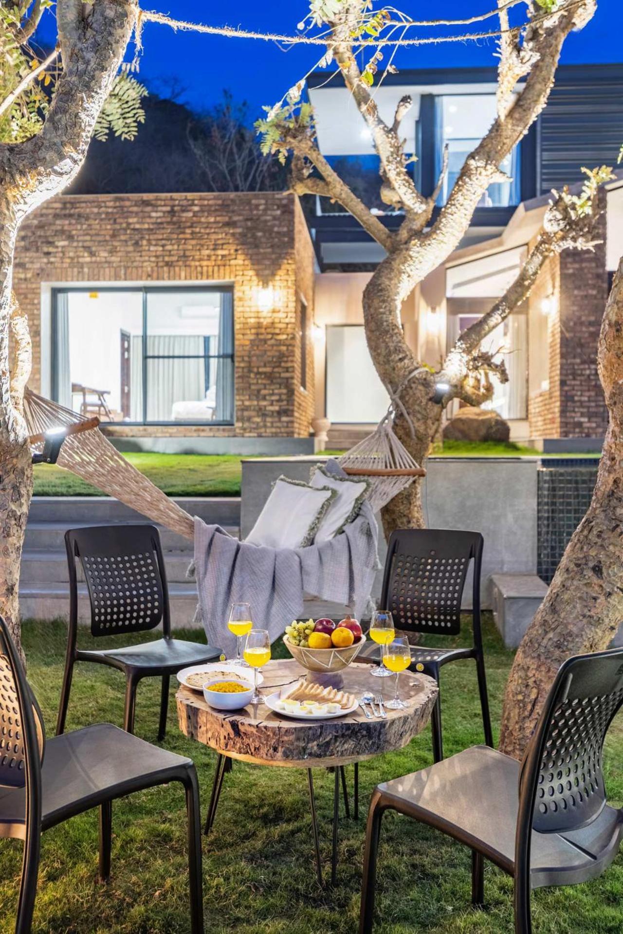 Stayvista's Ikebana - Living By The Forest Edge - Mountain-view With Infinity Pool, Lawn, & Indoor-outdoor Games